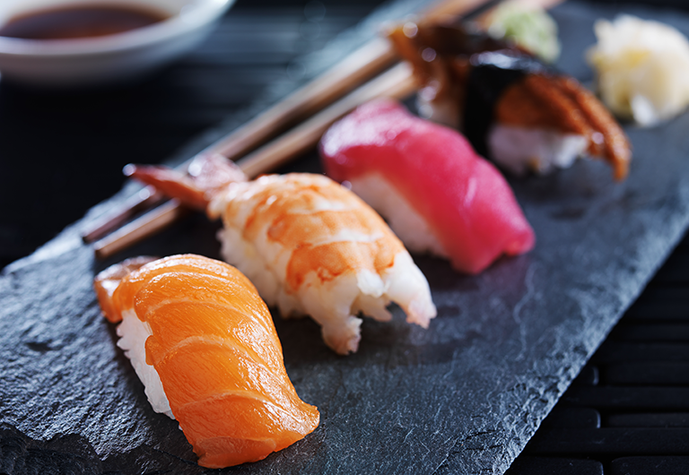  Close up photo of sushi grade nigiri.